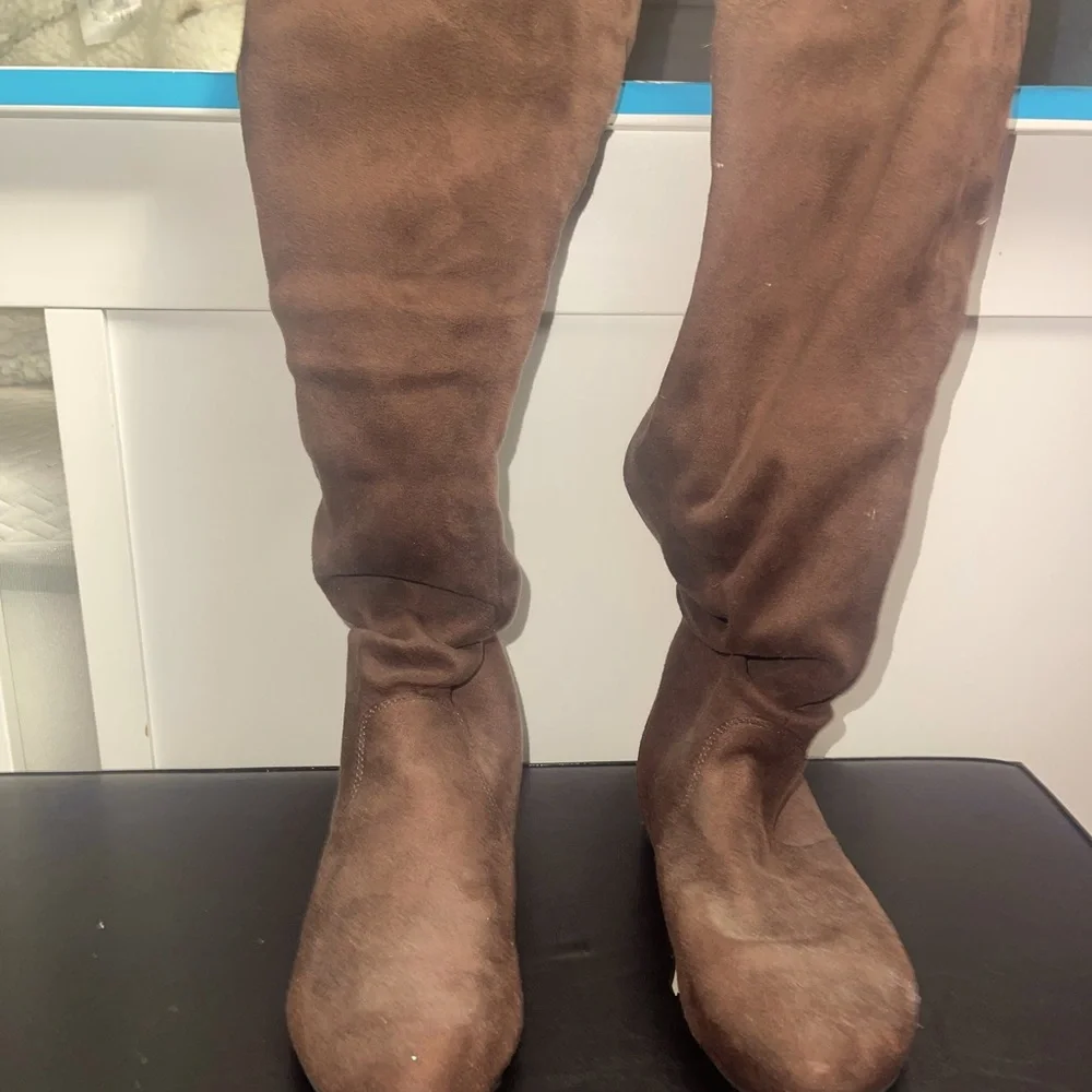 Brown knee high boots